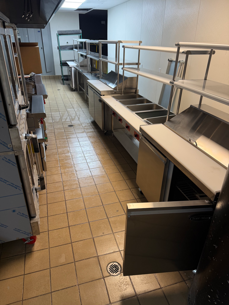 Restaurant kitchen line, spotless floor to ceiling